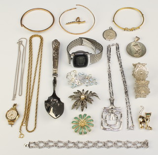 A gold bangle, a silver filigree bracelet and minor costume jewellery