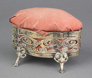 An Edwardian serpentine silver trinket box with pin cushion lid and pierced decoration on pad feet Birmingham 1903 