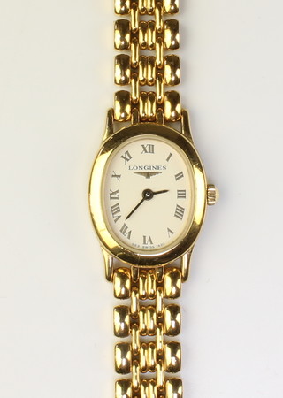 A lady's gold plated Longines wristwatch, boxed