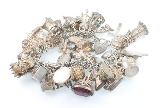 A silver charm bracelet approx. 150 grams 