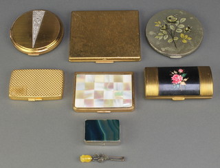 A gilt cigarette case, minor compacts and pill boxes