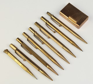A gold plated Dupont cigarette lighter, 8 gold plated propelling pencils