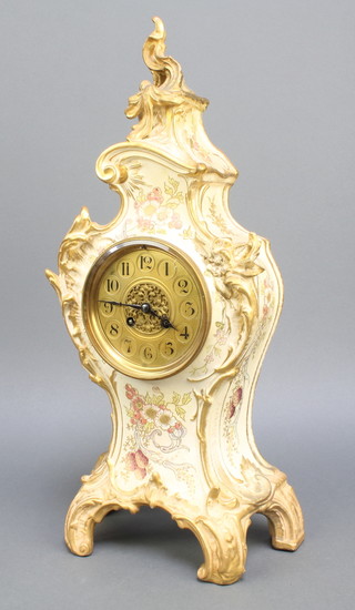 A Victorian French 8 day striking mantel clock with gilt dial and Arabic numerals contained in a Worcester style pottery case 