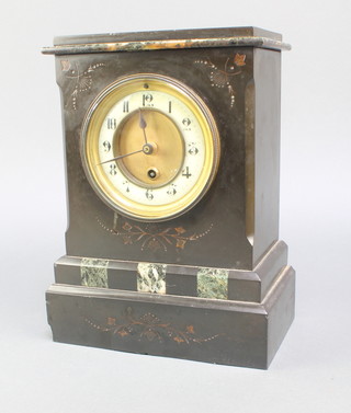 A Victorian mantel timepiece with enamelled dial and Arabic numerals contained in a black architectural case 