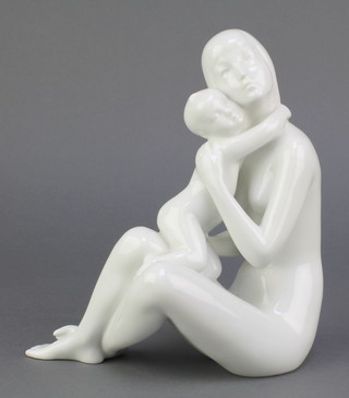 A Royal Dux white glazed figure of a seated mother holding a child 8" 