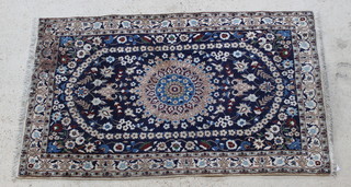 A blue and white ground Persian Nain rug with central medallion 85" x 46" 