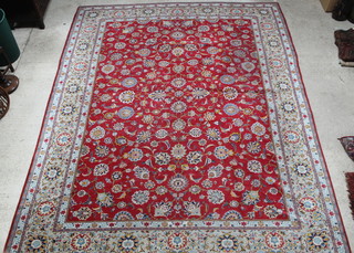 A red and white Isfahan carpet with floral ground 161" x 129"  