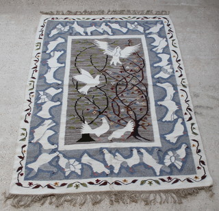 A Setsoto design wool work rug decorated white doves 94" x 69" 