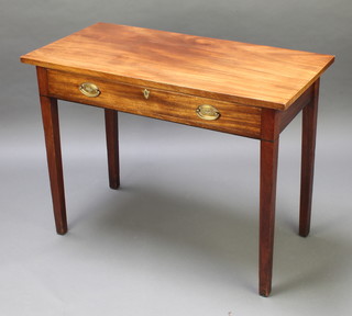 A 19th Century rectangular mahogany side/writing table, fitted a frieze drawer with brass oval plate drop handles and raised on square tapered supports 29"h x 38 1/2"w x 19 1/2"d 