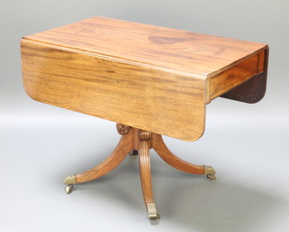 A 19th Century mahogany pedestal Pembroke table fitted a drawer, raised on a turned column and tripod supports 28"h x 37"w x 21" when closed x 43" when open 