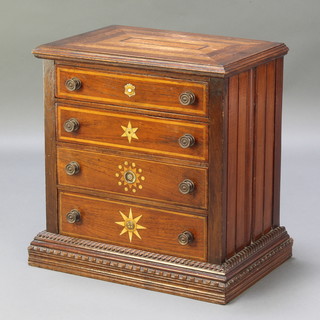 A Victorian inlaid mahogany table top chest, the top inset various specimen woods, fitted long drawers with brass handles, on a carved platform base 19"h x 17 1/2"w x 12"d 