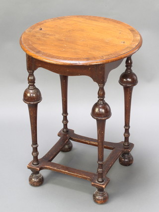 A Queen Anne style circular walnut and crossbanded occasional table, raised on cup and cover supports with box framed stretcher 24"h x 18" diam. 