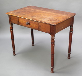 A Victorian rectangular mahogany side table fitted a drawer and raised on turned supports 29"h x 36"w x 22"d 