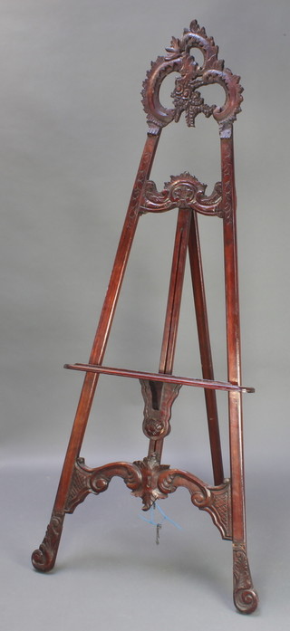 A 19th Century style carved mahogany easel, 78"h 