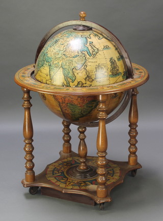 A mid 20th Century cocktail cabinet in the form of a terrestrial globe, 36"h x 27 1/2"diam. 