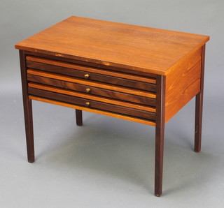 Illum Wikkelso, a mid 20th Century rectangular teak table raised on square supports, fitted 3 folding tray tables 19 1/2"h x 24"w x 16"d  
