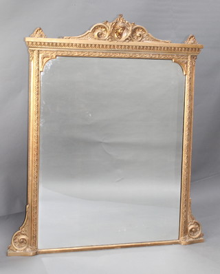 A 19th Century rectangular plate mirror contained in a decorative gilt frame surmounted by a portrait bust of a classical man 60"h x 45 1/2" 