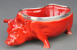 An early 20th Century Royal Doulton flambe bowl in the form of a pig with silver rim 6 1/2" 