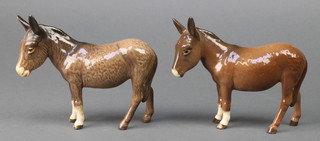A Beswick figure Donkey, brown gloss, 1364B 4 1/2", mottled, a ditto brown glaze gloss 4 1/2" 