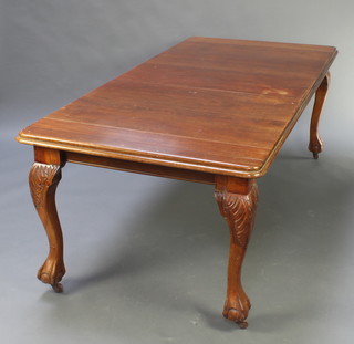 A Chippendale style rectangular mahogany dining table, raised on carved cabriole ball and claw supports  28"h x 77 1/2"l 