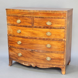 A Georgian inlaid and crossbanded mahogany bow front chest of 2 short and 2 long drawers with brass plate drop handles, the sides fitted 2 secret drawers, raised on bracket feet 45"h x 45 1/2"w x 22"d   