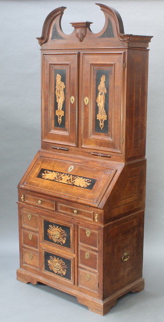 A 18th/19th Century "Austrian" inlaid walnut bureau cabinet, the upper section with broken pediment above a cupboard with 18 shallow drawers drawers above 2 double cupboards all enclosed by panelled doors decorated figures of lady and gentleman musicians and 2 candle slides, the inlaid fall front decorated musical trophies revealing 2 long and 4 short drawers, the base fitted 2 central drawers decorated musical trophies, flanked by 6 drawers enclosed by dummy drawer panelled doors with carrying handles to the side   98"h x 38 1/2w 23"d  