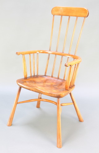 A yew and elm stick and bar back kitchen chair with solid elm seat and crinoline stretcher