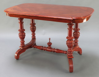 A Dutch Victorian mahogany centre table, the crossbanded top with quarter veneering raised on 4 turned columns with H framed stretcher 30"h x 47"w x 30"d 