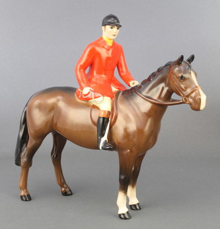 A Beswick figure Huntsman, brown horse gloss, 1501 8 1/2" 