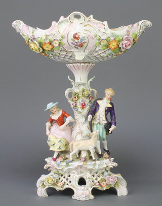 A Potschappel centrepiece, the base with a lady, gentleman and sheep, extensively applied all over with flowers  14" 
