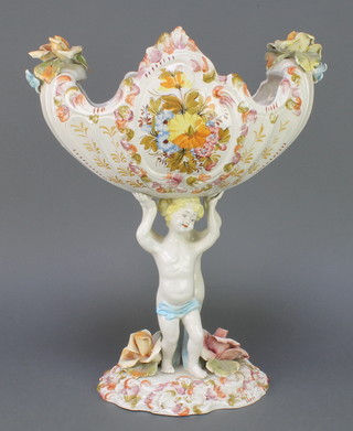 An Italian polychrome table centrepiece supported by Putti 18" 