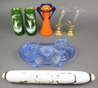 A pair of Mary Gregory style green glass cylindrical vases decorated with a figure of a boy and girl 7 1/2", a 2 colour glass vase, a 4 piece blue glass dressing table set, Victorian ex painted rolling pin and 2 glass epergne with brass bases 
