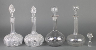 A pair of Edwardian mallet shaped decanters and stoppers 11", 2 others and a spare stopper