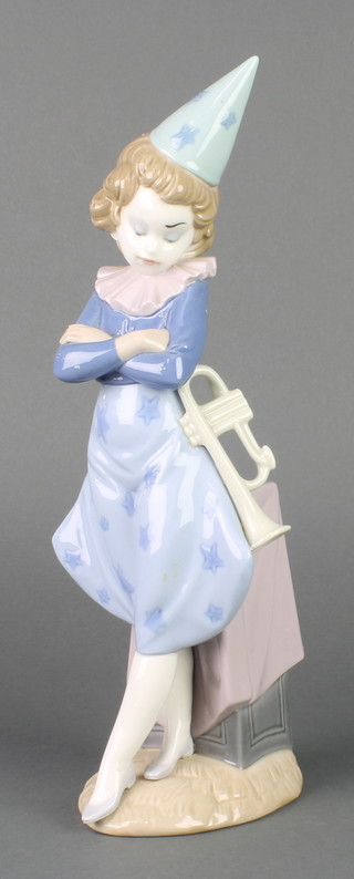 A Lladro figure of a female clown with trumpet 5060 14 1/2", boxed