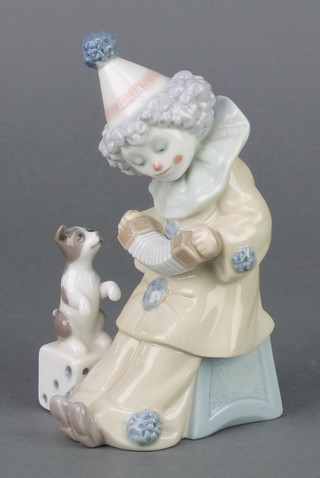 A Lladro figure Pierrot with concertina 5279 6", boxed