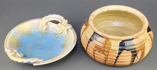 A Studio ceramic bowl with rope twist and floral handles, a ditto ribbed slip glazed bowl 12" 