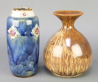 A Denby brown glazed baluster vase 8", a Royal Doulton cylindrical vase with stylised floral motifs 9" 