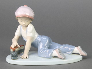 A Lladro Collectors Society figure All Aboard 7619 9 1/2", boxed