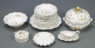 A modern Quimper dinner service decorated with figures comprising 5 dinner plates, 6 soup bowls, a salad bowl, tureen and cover, butter dish and cover, sauce boat and stand and dish 