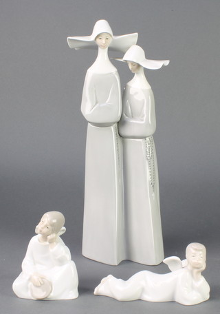 A Lladro group of 2 nuns 13" and 2 Nao angels