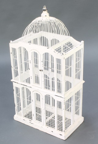 A Continental white painted and wire work domed bird cage 29 1/2"h x 15"w x 8 1/2"d 