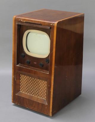 A KB model no.FV40L black and white television with 11 1/2" screen contained in a walnut and crossbanded case 35"h x 19"w x 19 1/2" 