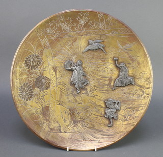 A Japanese gilt metal and antimony charger decorated figures  and flowers 17 1/2" 