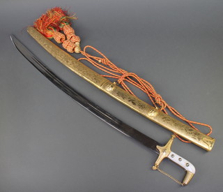 A Saudi Arabian marmaduke style sword with gilt scabbard 