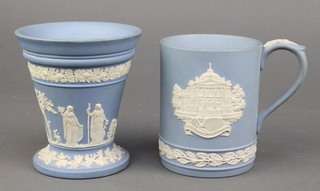 A Wedgwood blue jasper commemorative mug - Tate Gallery Christmas 1985 4 1/2" together with a tapered vase 5" 