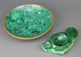 A malachite ashtray in the form of an arrangement of fruit 9" and a circular malachite dish 11" 
