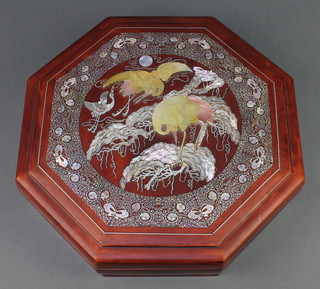 An octagonal Korean red lacquered hors d'oeuvres box the mother of pearl decorated lid with heron  3" x 12" x 12"  