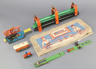 An Albula railway game part boxed and a tin plate clockwork car lift 