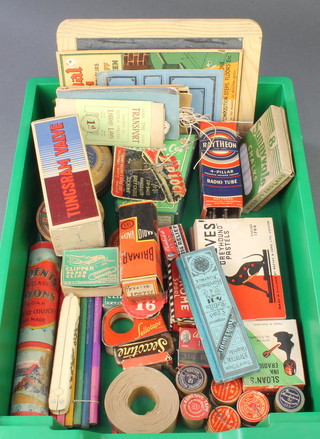 A cylindrical carton of Students high class crayons, carton of Clipper paper clips, carton of Perry & Co elastic bands, 3 cartons of various valves etc
