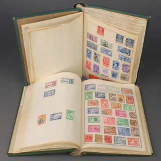 2 albums of mixed used world stamps 